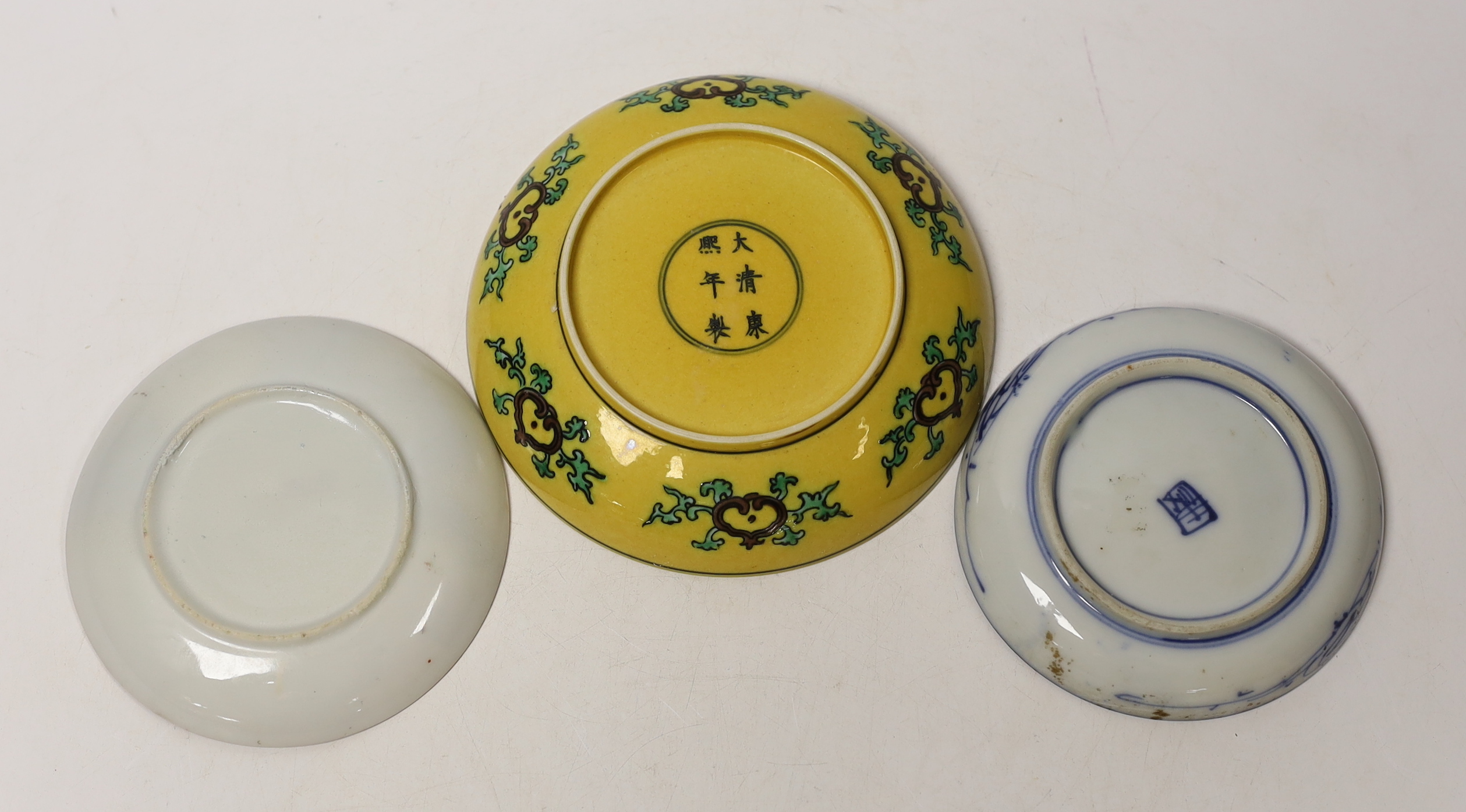Three Chinese saucers including a ‘dragon’ example, largest 13cm in diameter